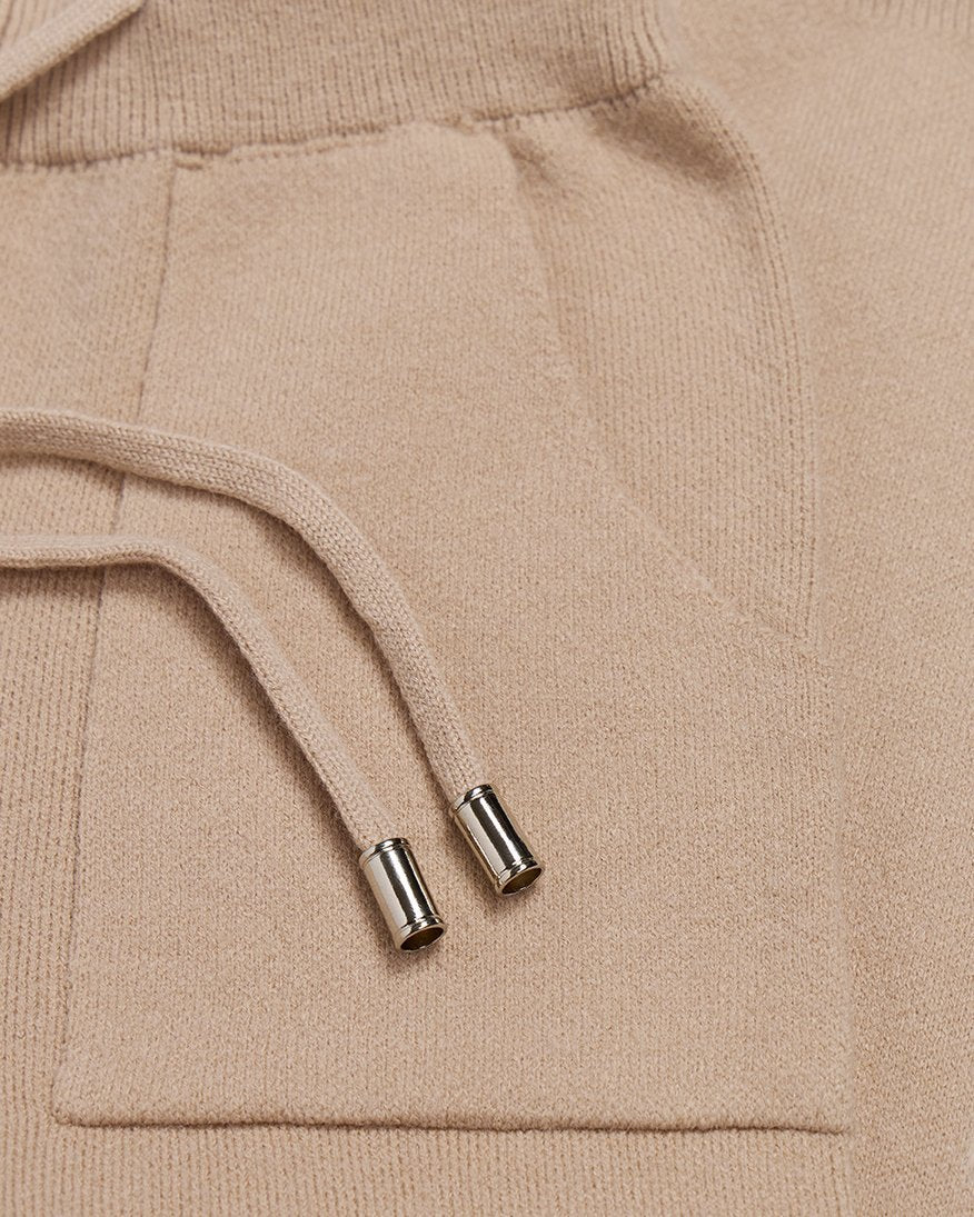 The Snow Day Set in Sand - close detail of the knit drawstring, silver tips and patch pocket, Fox & Ocean kids knit tracksuit