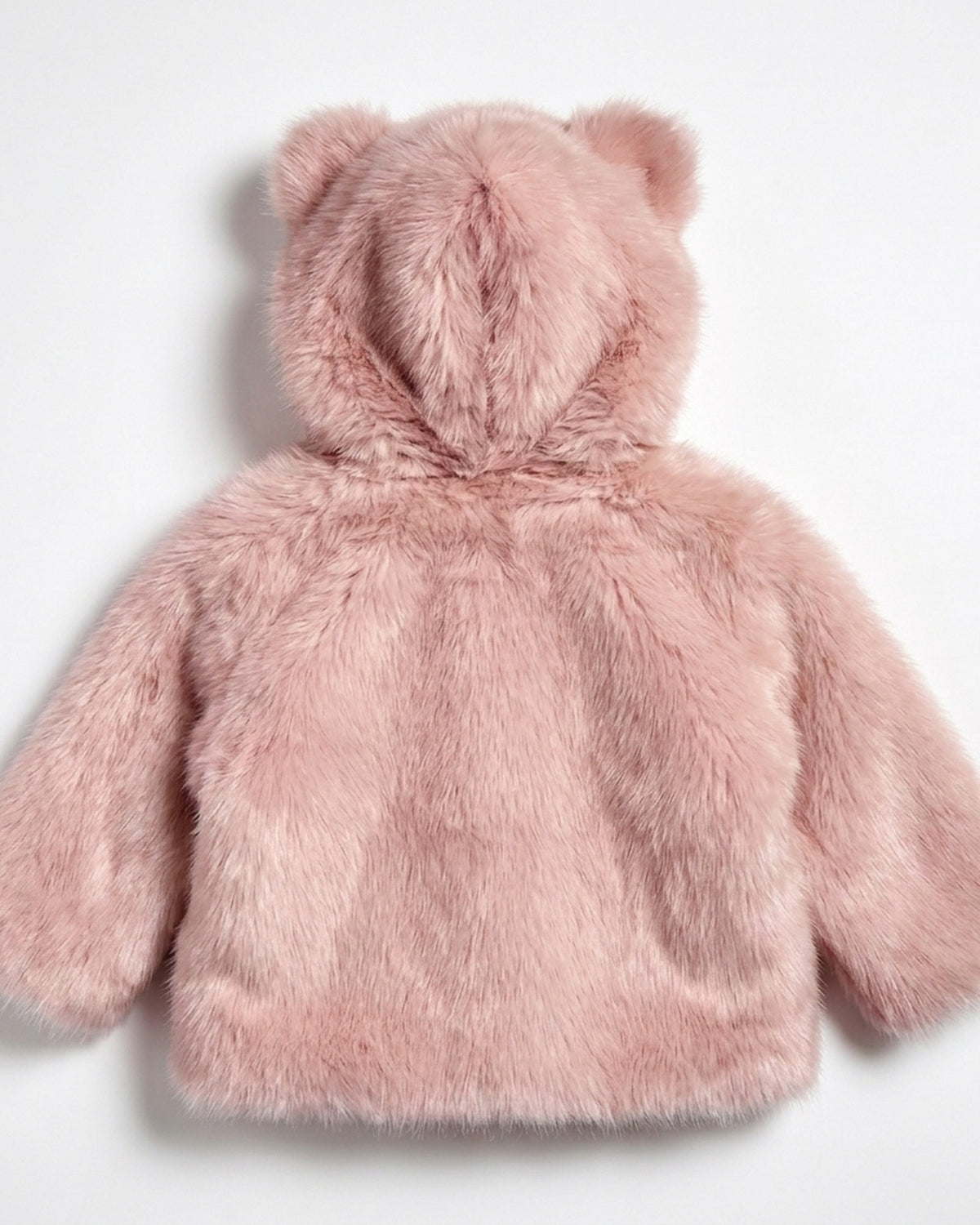 The Little Bear kids faux fur coat in Blush dusty rose pink — back view, hood laid flat showing both bear ears, Fox & Ocean