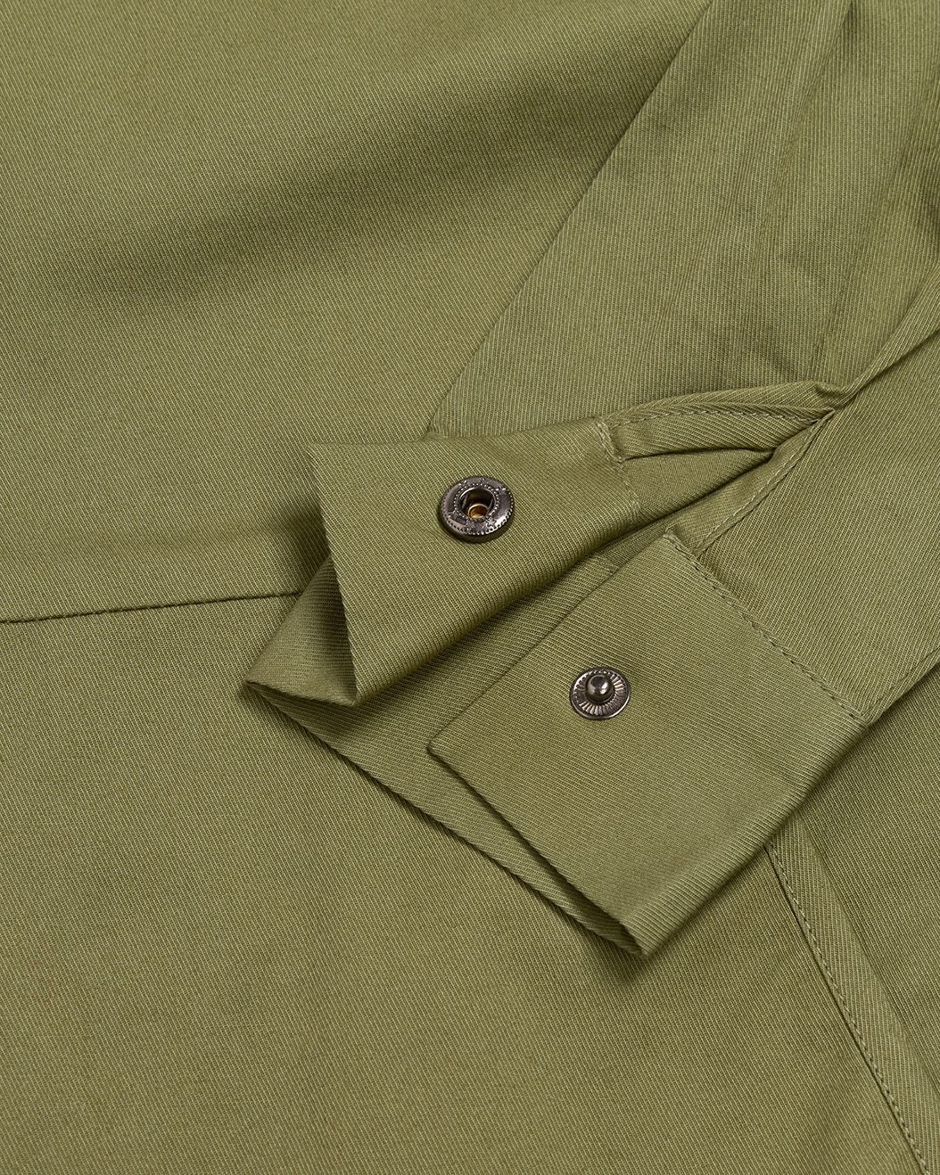 Meadow green kids jumpsuit snap-closure sleeve cuff detail