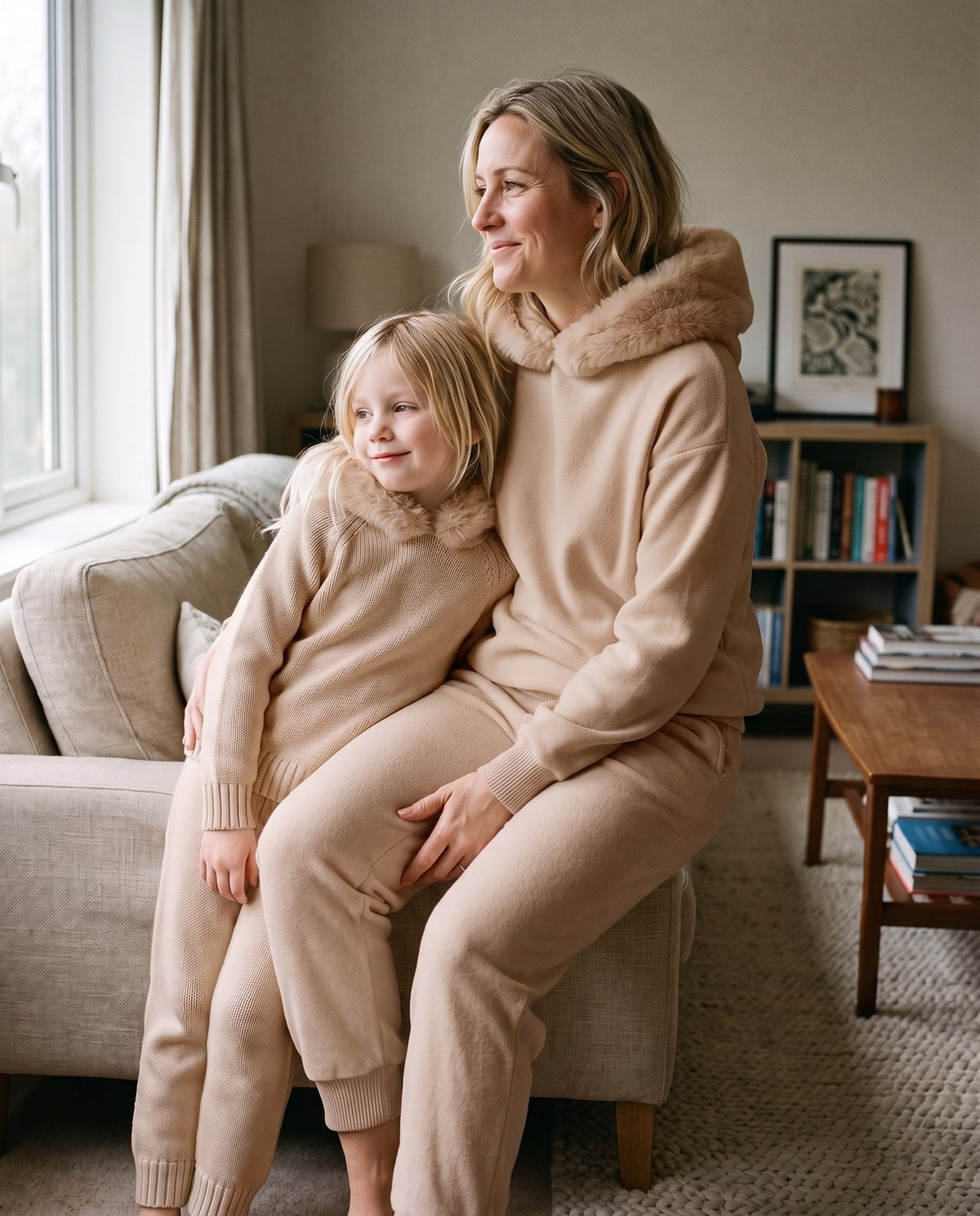A mother and her daughter together in the matching Snow Day Set in Sand, Fox & Ocean